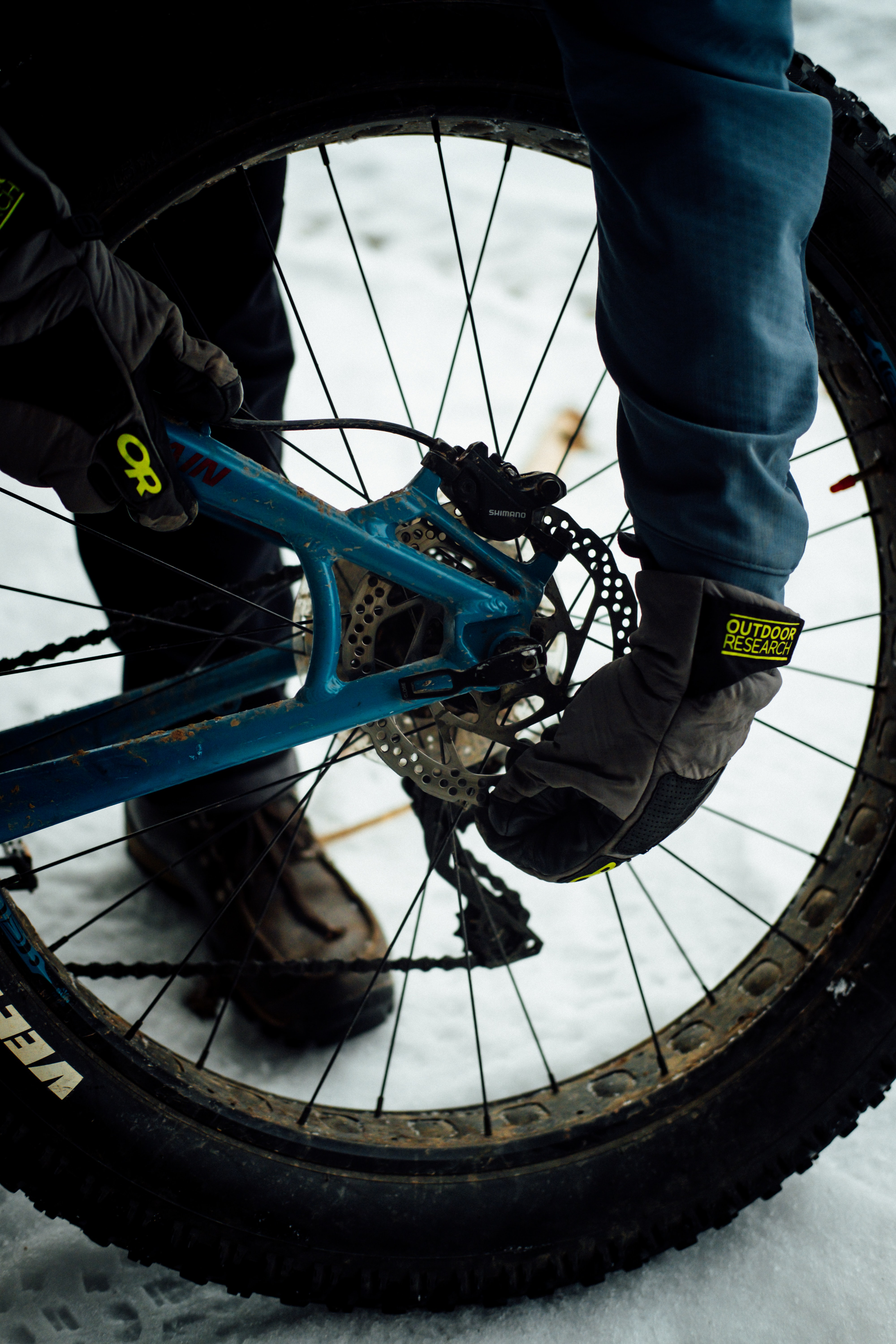 Man fixing bike hub